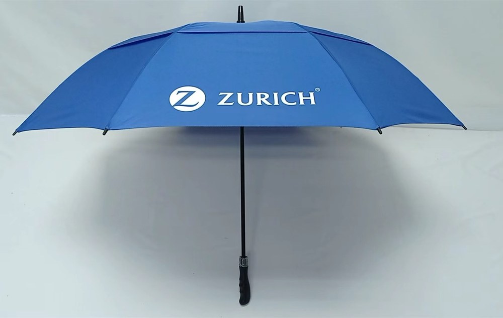 Blue umbrella with white Zurich logo