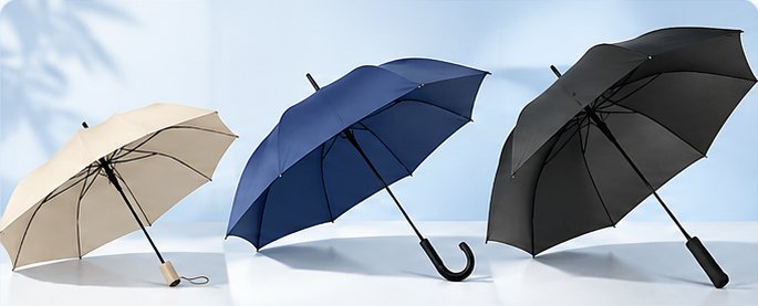 Beige, navy and black umbrellas with different handles
